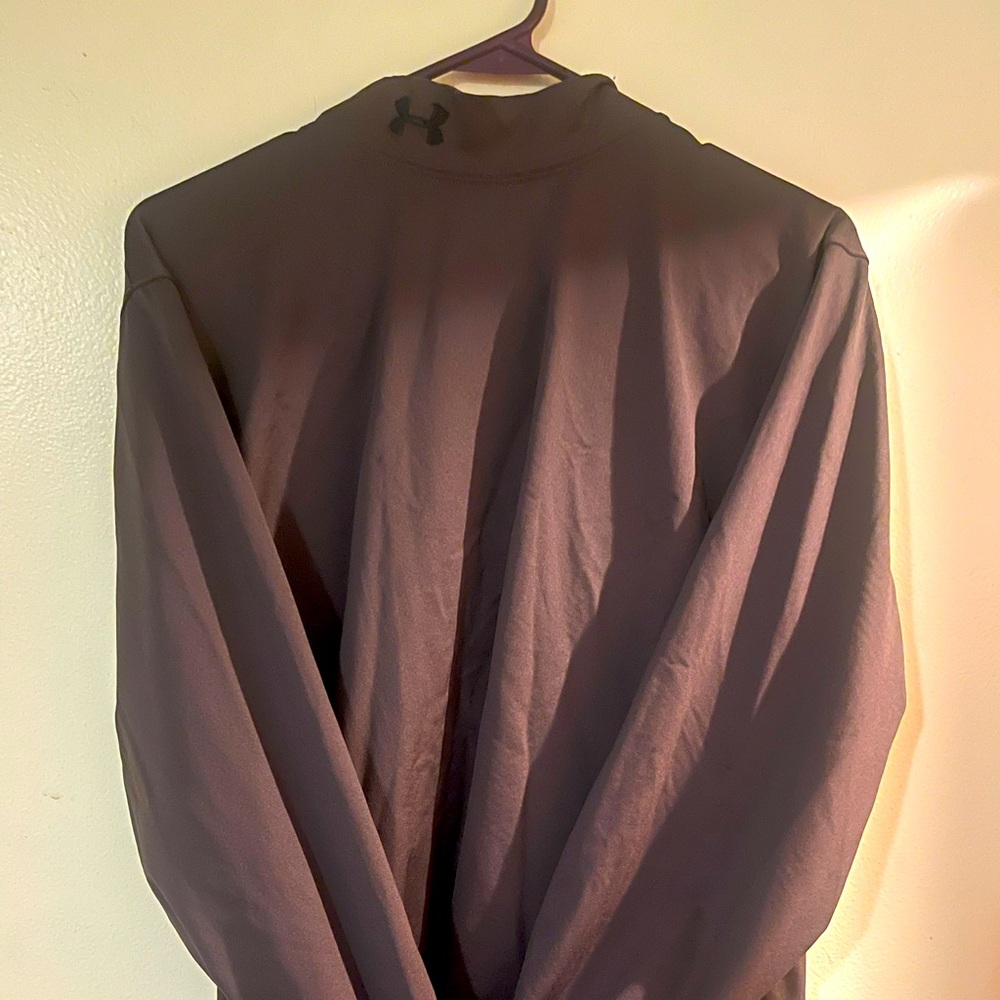 Men’s cold gear . Has a nice lining inside . So warm chocolate brown color